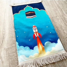 Load image into Gallery viewer, Lift off to Makkah Children&#39;s Prayer Mat
